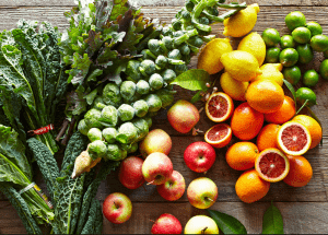a group of fruits and vegetables on a wood surface Healthy Weight Loss Diets Belper